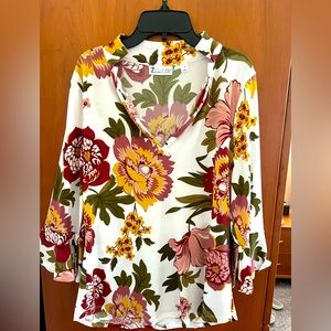 Gorgeous brand new long sleeve blouse.